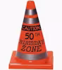 orange cone that says caution 50th birthday zone